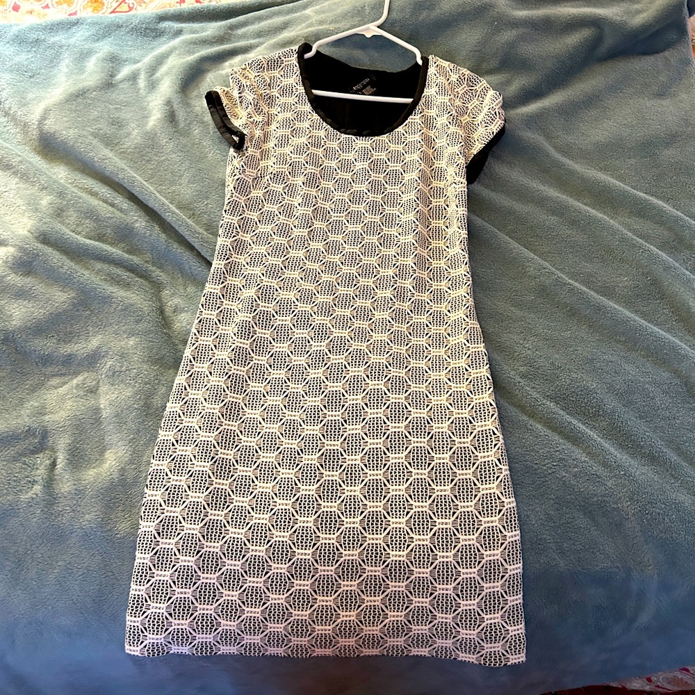 Versatile white lace black trim dress